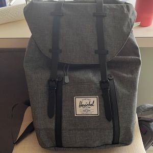 HERSCHEL gray back pack. With black straps